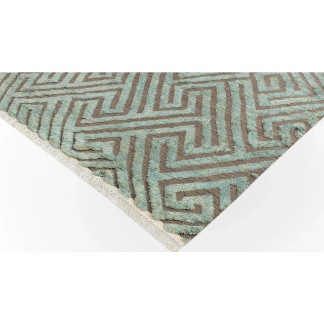 Make a statement in your home with this meticulously hand-knotted high-low pile Moroccan wool rug. An intricate design...