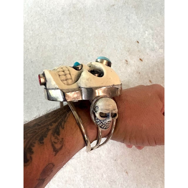 Wonder large silver and resin skull bracelet. Perfect for your Halloween costume.