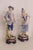 This gorgeous Pair of 2 Figurines is made of porcelain with a glossy finish. These beautiful pieces present a primarily...