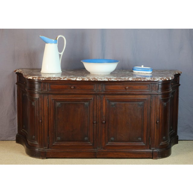 Napoleon III period washstand in very good condition. This cabinet, with its curved sides, opens with two central doors...
