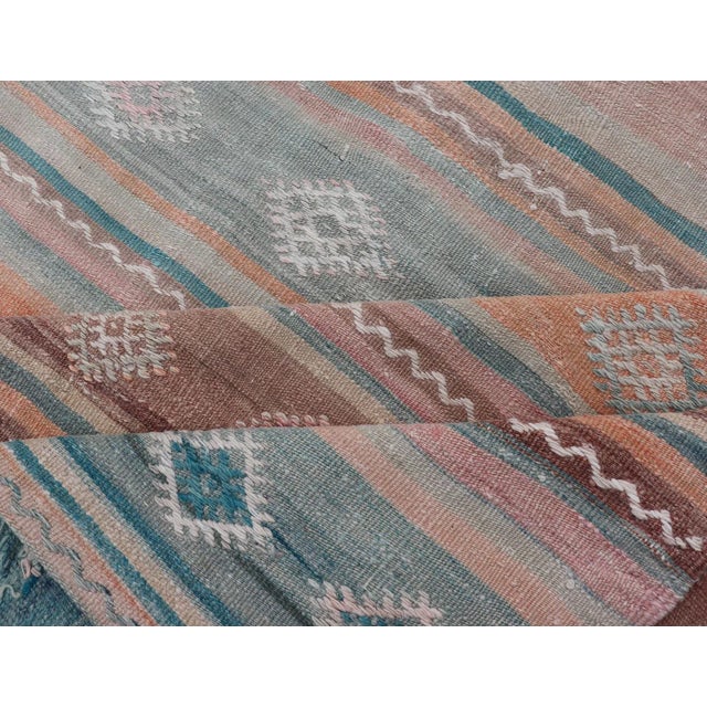 Mid 20th Century Mid 20th Century Vintage Turkish Gallery Kilim With Stripes and Tribal Motifs in Muted Tones For Sale - Image 11 of 13