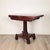A late Regency period pedestal game table, England circa 1825. Measures 29.5" h x 36.25" w x 18" d when closed; 28.5" h x...