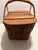 This is a beautiful vintage picnic basket made of oak wood from the 1940’s or 1950’s. It has an amazing brownish-red...
