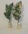 Unique pair of vintage Italian Gold Leaf Tole Finials set in brass bases. Triple set of leaves reaches upward to reflect...