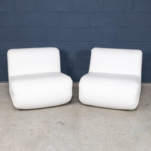 A pair of “boomerang” lounge chairs designed by rodolfo bonetto for b-line in the late 20th century, newly reupholstered...