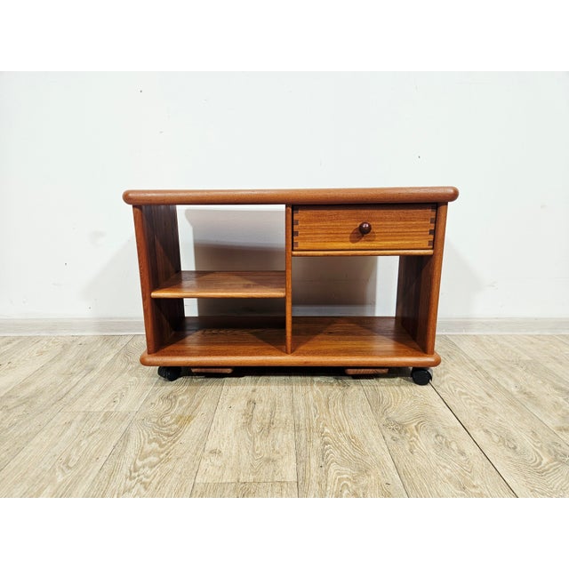 I am offering a unique, multifunctional piece of furniture from the 1970s that works perfectly as a coffee table, a low...