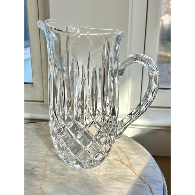 Large vintage crystal-cut pitcher like condition. This unique, heavy, and large pitcher closely resembles the often hard-...