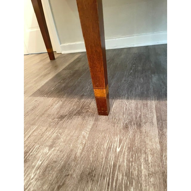 Handsome English Sheraton style mahoganny extention table. Suitable for dining or boardroom. Inlaid on top, apron and...