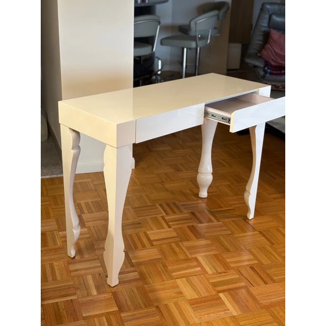 Posh expensive-looking modern style console table; white laquer; minor miniscule scratch, otherwise excellent condition;...