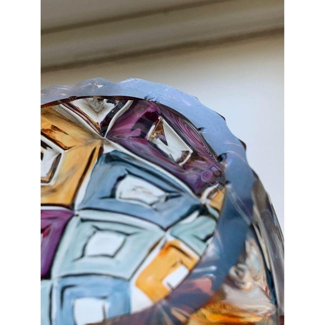 This striking mid-century art glass vase features a richly faceted geometric diamond pattern rendered in vibrant jewel...