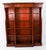 This is a delightful vintage open bookcase in the Sheraton style, dating from the late 20th Century. This breakfront open...