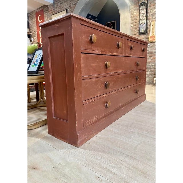 Great old storage cabinet in old red paint. Most likely used in a kitchen or pantry for storage. Nice shallow depth and...
