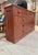 Great old storage cabinet in old red paint. Most likely used in a kitchen or pantry for storage. Nice shallow depth and...
