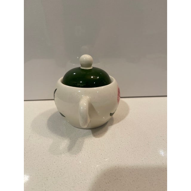 This is a vintage Stangl Pottery sugar bowl and matching lid in the Pink Thistle pattern. This pattern was produced by...