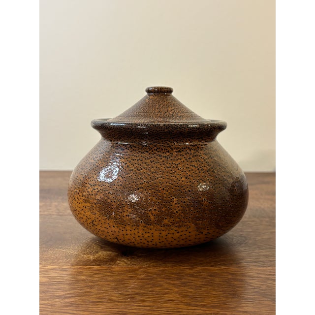 A beautifully crafted vintage coastal palm wood vessel featuring the distinctive dotted grain pattern unique to palm. The...