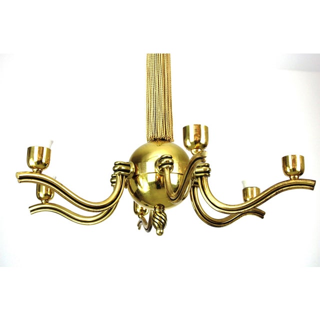 impressive chandelier, heavy solid brass design, 6-bulb E27. This piece is attributed to the mentioned designer/maker. It...