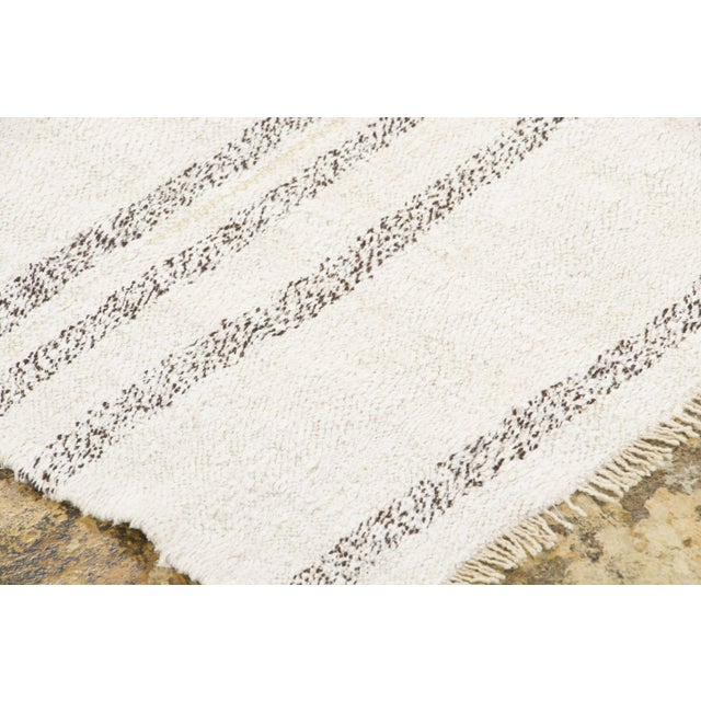 Handwoven in pure hemp originating circa 1950-1959, this 5x9 vintage Turkish kilim rug joins Rug & Kilim’s Kilim & Flat...