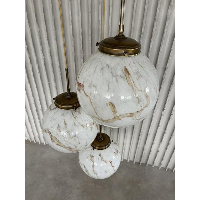 Designer unknown France 1960s H 225cm (adjustable longer and shorter) Bulbs Ø 30cm Bring a touch of Parisian charm into...