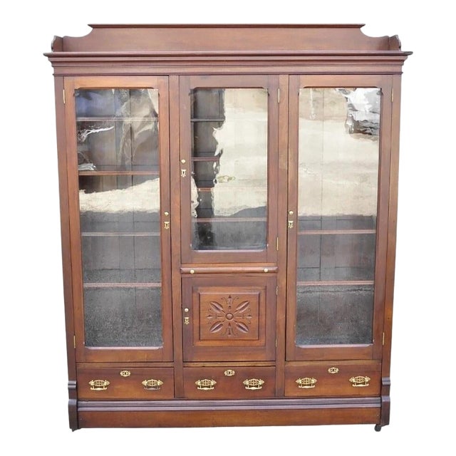 Antique Eastlake Victorian Walnut Wavy Glass Triple Bookcase Display Cabinet For Sale