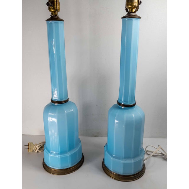 We are selling this stunning pair of French Opaline glass type table lamps. These table lamps have the most striking sky...