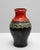 This 20th-century German ceramic vase embodies the bold and expressive aesthetic of mid-century European pottery....