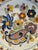 18th Century Delft Polychrome Charger With Floral and Scroll Motif For Sale - Image 6 of 8