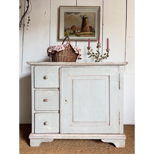 A lovely 19th century Gustavian sideboard in its original paint. Sturdy and excellent depth for storage. Dimensions:...