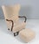 Alfred Christensen lounge chair with ottoman new upholstered with lamb wool. Legs and armrests of stained beech. Made in...