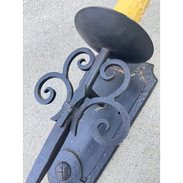 Beautiful antique solid wrought iron handmade Spanish sconces. Sourced from a storied Hollywood Hills original...