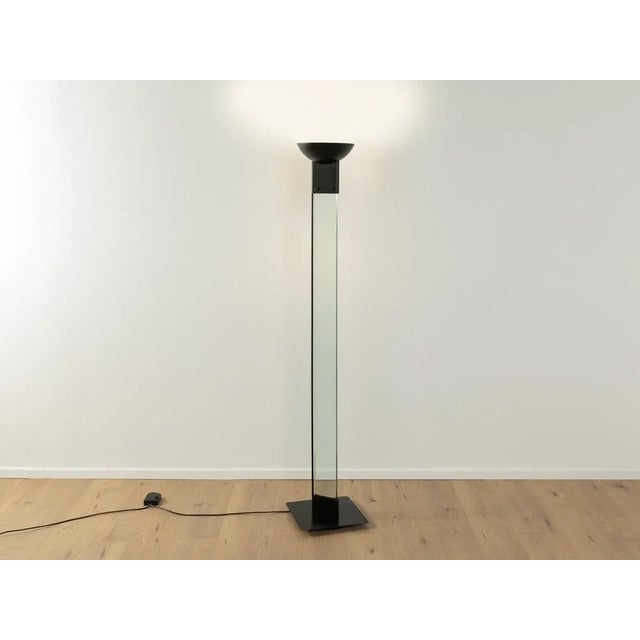 Floor lamp from the 1980s by Max Baguara for Lamperti. High quality glass frame (Murano) with black metal base. Quality...
