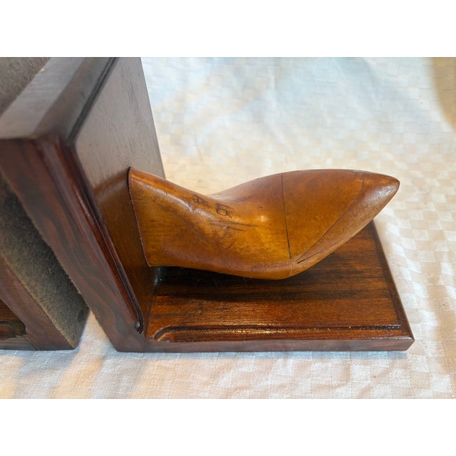 One of a kind bookends made with an 18th C shoe mold typical of the style of shoes worn by French aristocrats. In the 18th...
