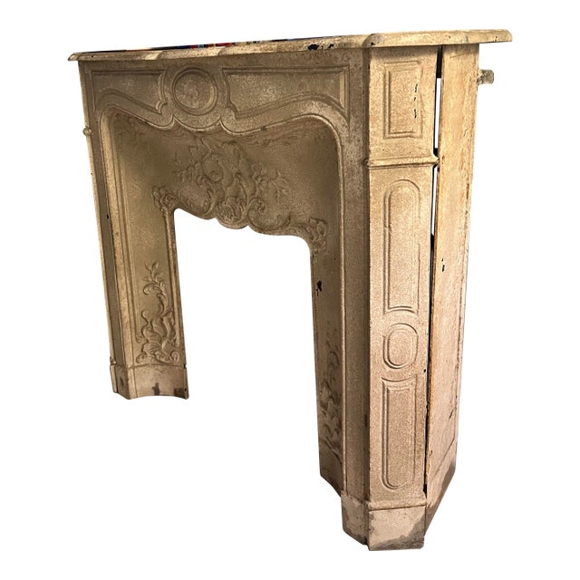 Antique French Louis XV Style Cast Iron Fireplace Mantel With Rocaille Cartouche, Painted Faux-Stone Finish For Sale