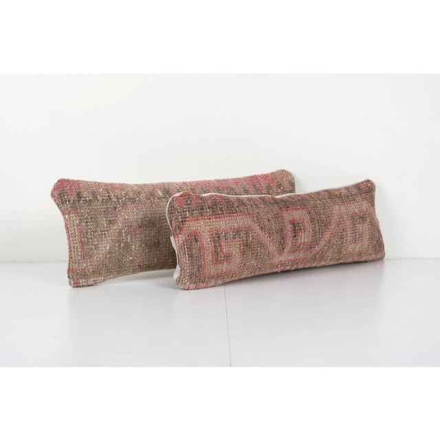 These beautiful 9" x 22" pillow covers were made from an authentic, vintage Turkish rug handwoven in the 1960s. Bright...