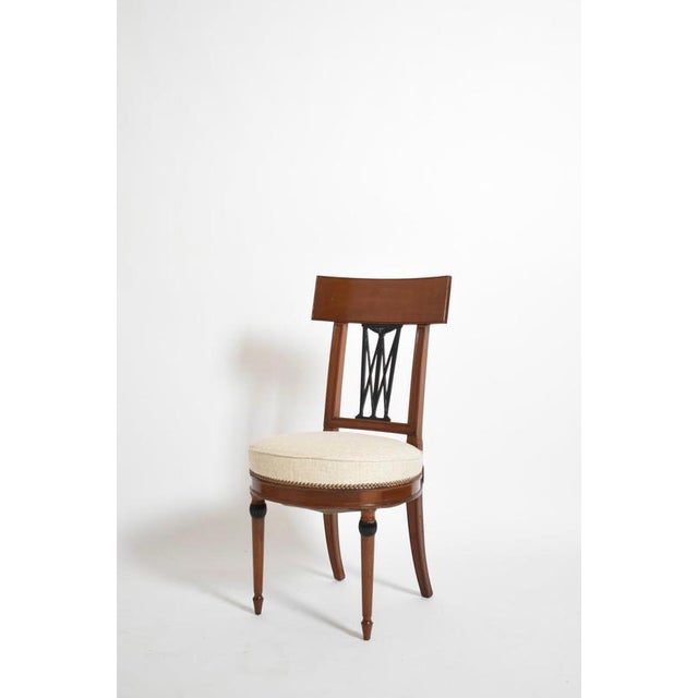 Set of four neoclassical chairs, 1920s. Height: 87 cm - 34.25 in Length: 43 cm - 16.93 in Width: 40 cm - 15.75 in Seating...
