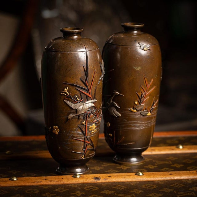 Antique 19th Century Japanese Meiji period pair of inlaid bronze ovoid vases by Miyabe Atsuyoshi, Kyoto. Each vase is...