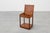 A refined and expressive example of early 20th‑century Dutch design, this Amsterdam School side table or small cabinet...
