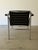 LC1 “Fauteuil à dossier basculant” armchair designed by Le Corbusier, Pierre Jeanneret, and Charlotte Perriand in 1928 and...