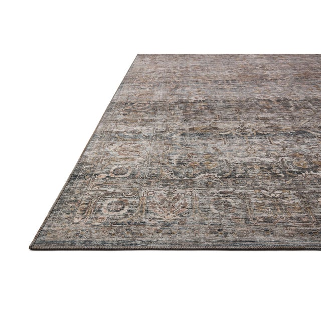 The Josie Collection is a machine-washable area rug with an exceptional design by Amber Lewis x Loloi. The rug’s...