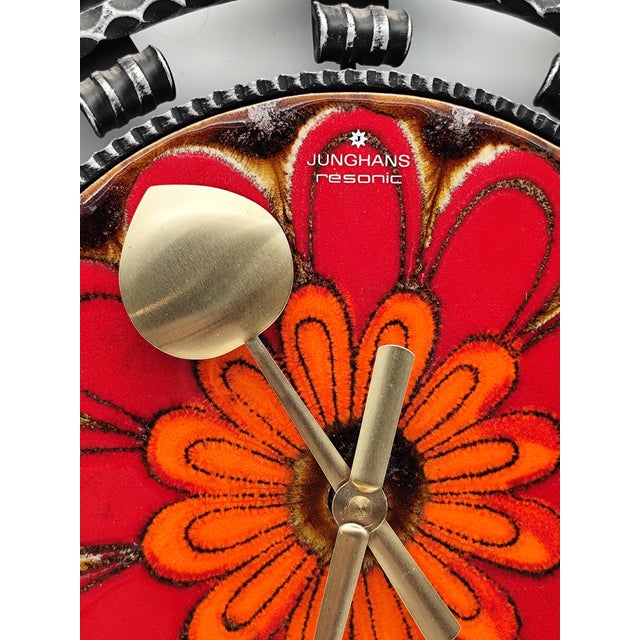 Vintage Junghans Wall Clock 37 cm, Height: 2 cm Material: Ceramic and iron frame Vibrant colors: Red, Orange, Metallic...