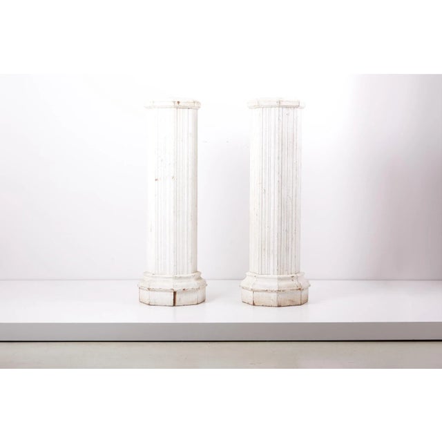 Pair of Italian oak pedestals from the beginning of the 20th century.