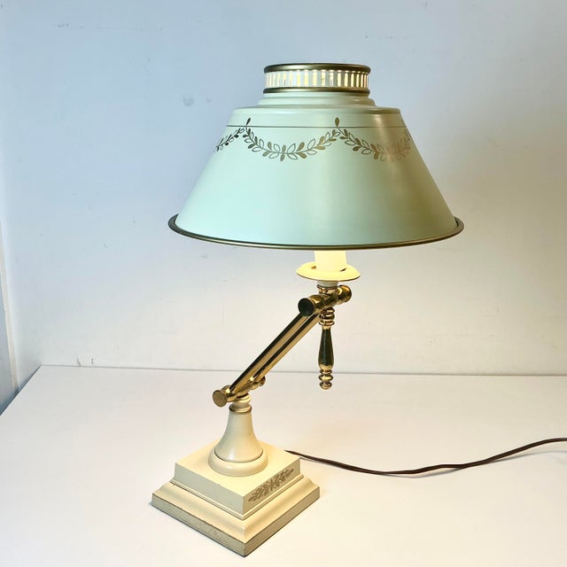 This is a lovely vintage Neoclassical French style Bouilette Tole Desk Lamp. It has the traditional articulating feature...