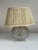 Design Plus Gallery presents a Vintage Pressed-Glass Globe Table Lamp from Fine Art Lamps. The clear molded glass base is...