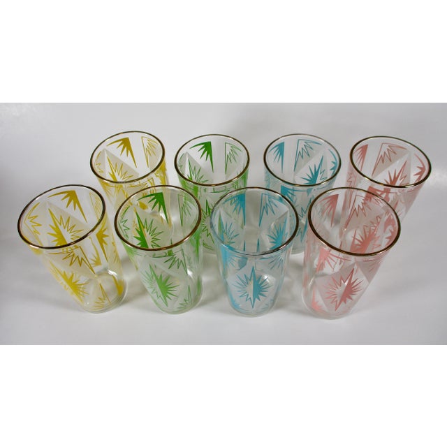 This vintage set of Hazel Atlas glasses features a mid-century modern starburst pattern in four pastel colors. (Two...