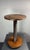 Gorgeous tall French side table from the 1940s- 1950s constructed in dark oak. The bases are generally made of...