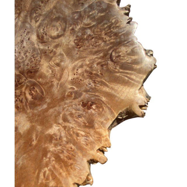 This stunning 11" pedestal bowl showcases the natural artistry of a maple burl, hand-turned to reveal its swirling grain,...
