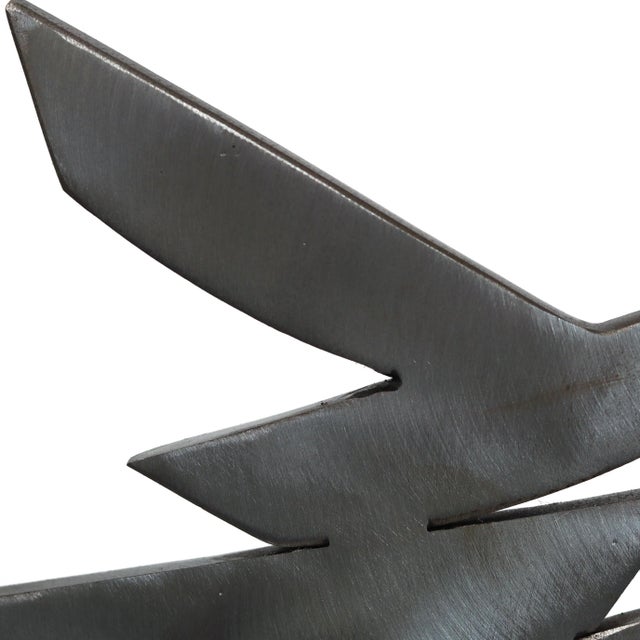 Inspired by dance and weightlessness, Granville Beals' industrial metal sculptures are primarily about relationships....