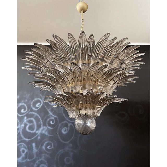 Palmette ceiling light made by 104 Murano smoked glasses in a gold metal frame. Murano blown glass in a traditional way....