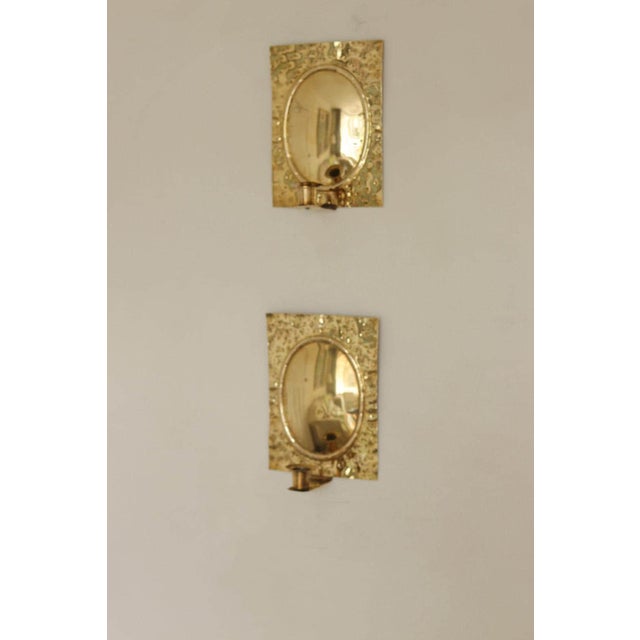 Stunning pair of Swedish brass sconces, featuring beautiful Hammered detailing on edges Both sconces are in very good...