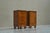 A truly magnificent pair of art deco cabinets in burl veneer, glass and patinated brass. Europe, 1930s. This pair of...