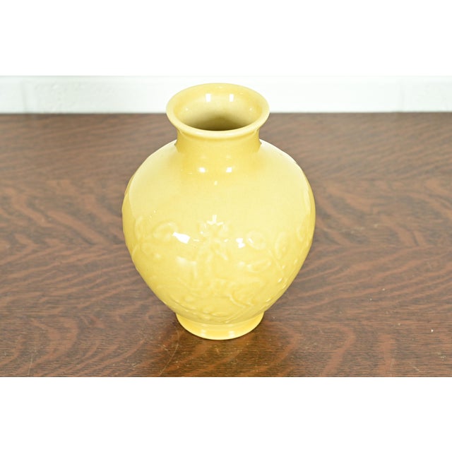 A gorgeous Arts & Crafts period glazed art pottery vase with low relief leaping stag and floral decoration By Rookwood...